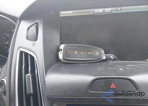 2015 Ford Focus Titanium from USA, damaged, VIN 1FADP3J27FL333002